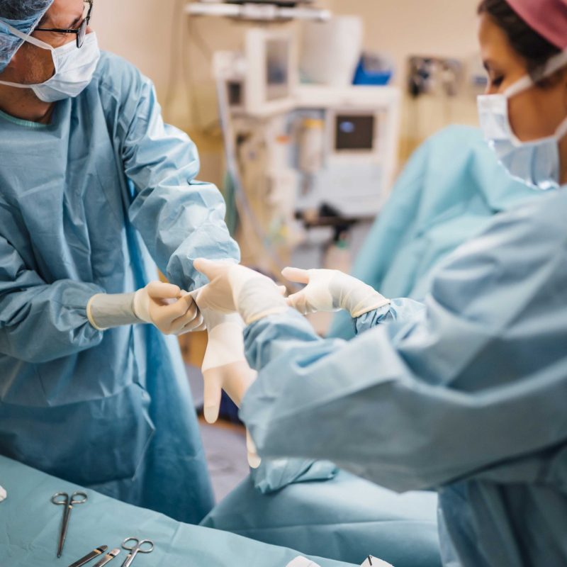 Surgeons and nurse during a foot surgery